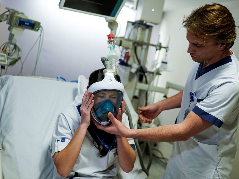 Hospitals turn to snorkel masks to ease respirator overload