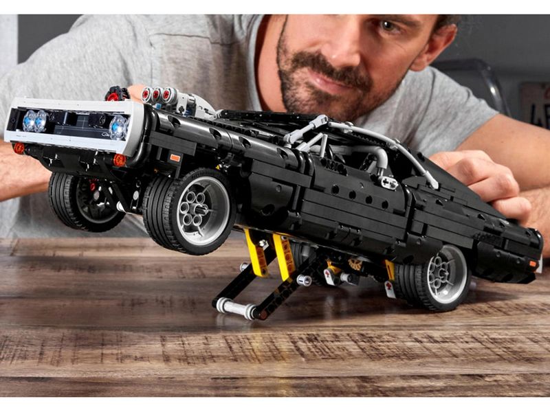 Lego constructor Fast Furious, 1970 Dodge Charger R T in hand of