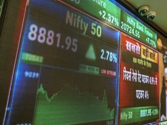 Stocks hit record, rupee gains on predicted Modi win
