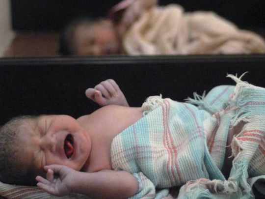 Newborn babies are shown at a hospital maternity ward in India, in this file photo from July 10, 2009 ---