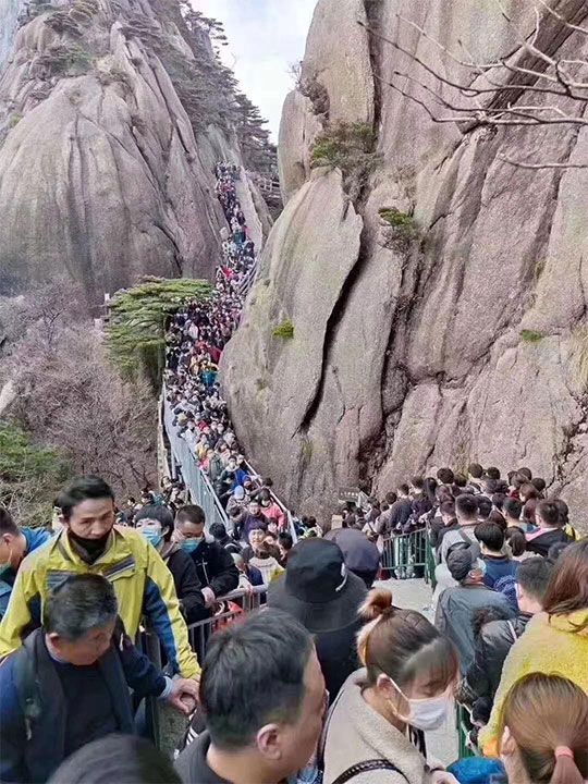 People are packed at Huangshan (Yellow Mountain), a jagged range of more than 70 knifelike peaks in eastern China’s Anhui province, after quarantine ban lifted in most parts of China.
