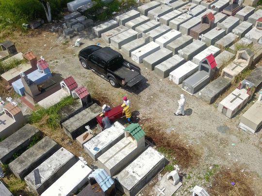 A burial on the outskirts of Guayaquil, Ecuador,