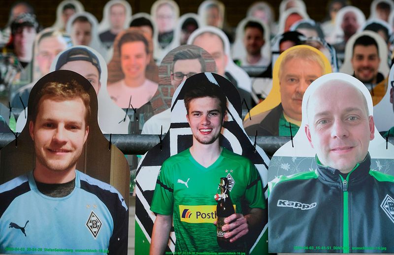 Cardboard cut-outs with portraits 