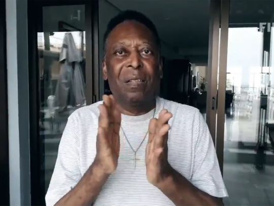 Pele applauds during the Fifa video