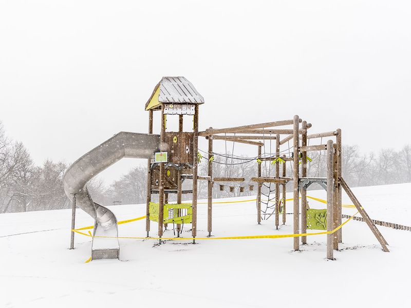 Playground covered in snow
