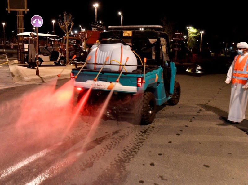 Modified vehicles spray Al Khawaneej during the sterilisation campaign