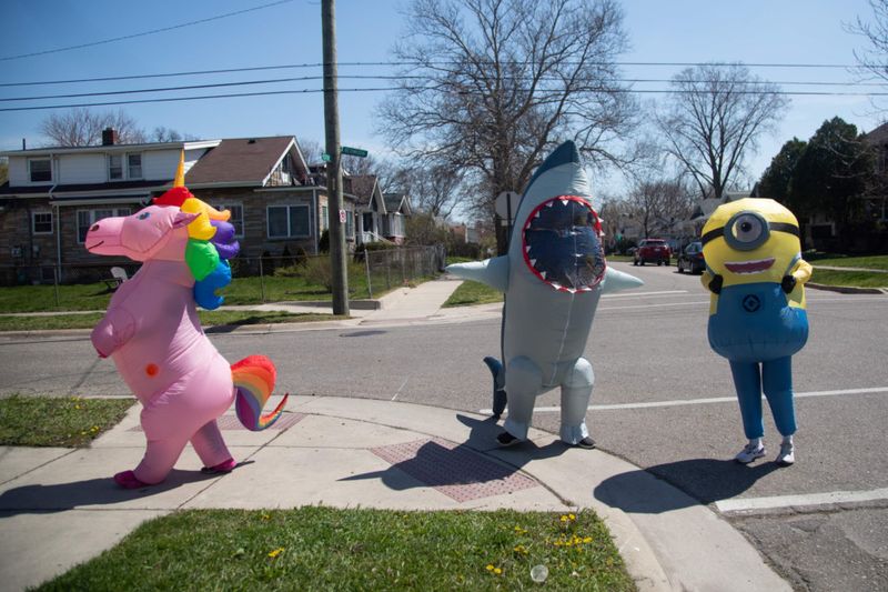 Look: The T-Rex Walking Club parades in Michigan | Lifestyle ...
