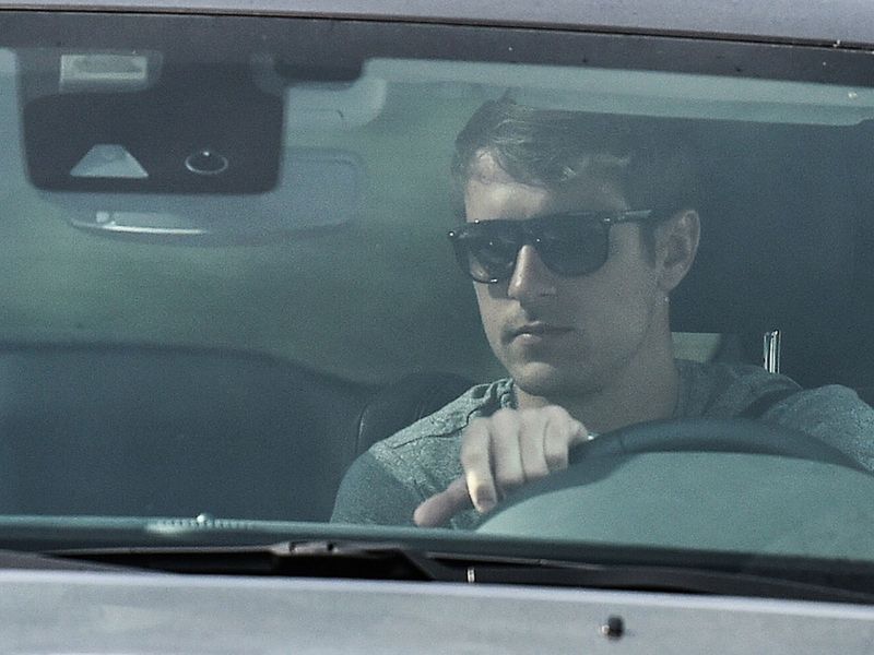 Juventus player Aaron Ramsey arrives in his car at the Juventus' Continassa training ground.  Juventus have recalled their 10 overseas players as Serie A clubs were given the green light to return to individual training 