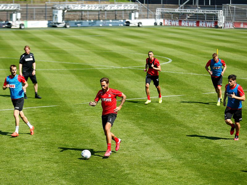Cologne's Marco Hoger with teammates during training this week