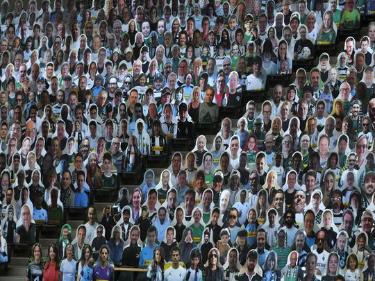 TOPSHOT - Cardboard cut-outs with portraits of Borussia Moenchegladbach's supporters are seen at the Borussia Park football stadium in Moenchengladbach, western Germany, on May 19, 2020, amid the novel coronavirus COVID-19 pandemic.   / AFP / Ina FASSBENDER
