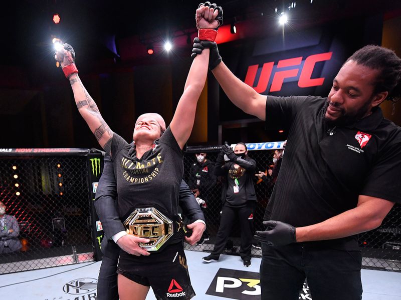 June 6, 2020; Las Vegas, NV, USA; Amanda Nunes of Brazil celebrates after her unanimous-decision victory over Felicia Spencer of Canada in their UFC featherweight championship bout during UFC 250 at the UFC APEX.  Mandatory Credit: Jeff Bottari/Zuffa LLC via USA TODAY Sports