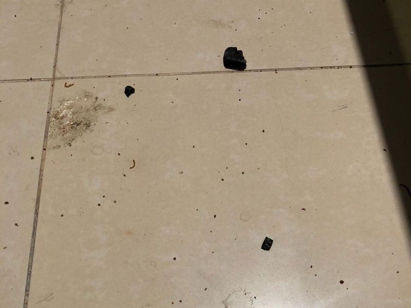 Lumps of shisha coal were found on balconies below in Al Khan
