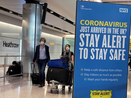 Passengers arrive at Heathrow Airport Britain