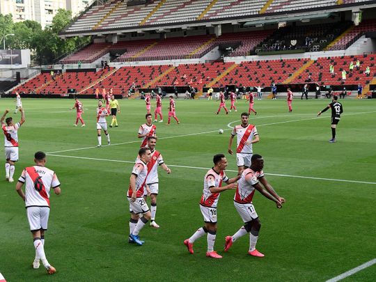 Rayo's Peruvian defender Advincula celebrates his goal with teammates during the match against Albacete at the Vallecas stadium in Madrid.