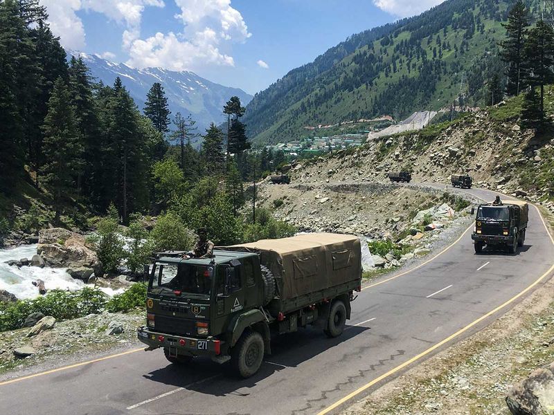 An Indian army convoy makes way towards Leh, bordering China, in Gagangir 