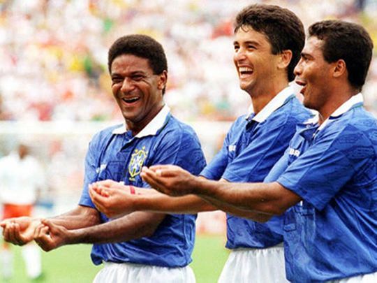 Bebeto, centre, creates a moment of history with his celebration at USA 94.