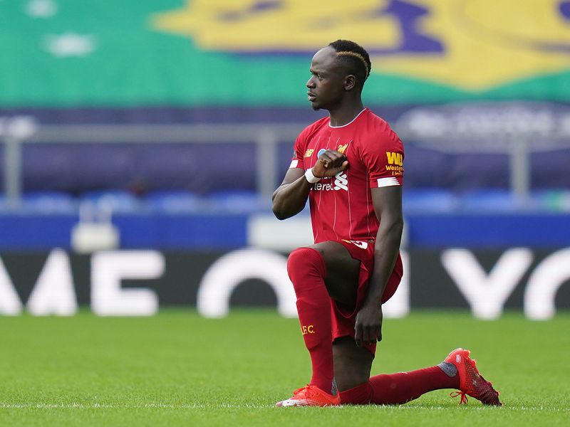 Liverpool's Sadio Mane finally takes a knee after his gaffe