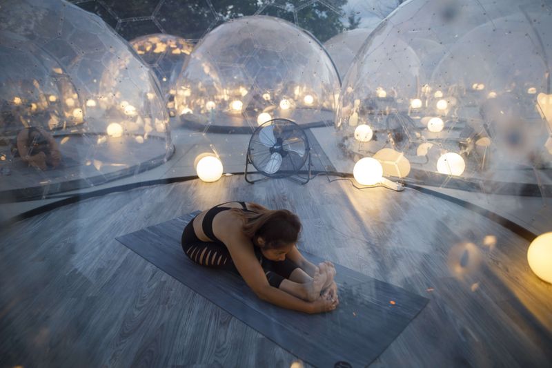 Pod Yoga' Lets You Attend Yoga Class Inside a Plastic Dome