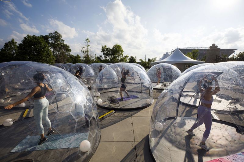 COVID-19 impact: Outdoor yoga in bubble pods in Canada