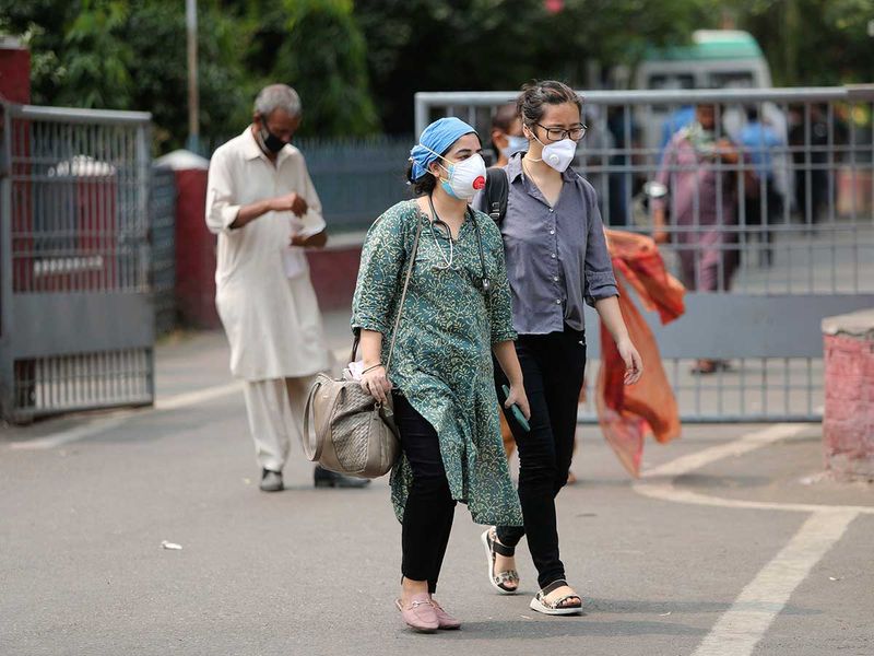Indian doctors wearing masks Jammu hospital