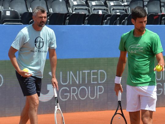 Former Wimbledon champion Goran Ivanisevic, left, now coaches top-ranked Novak Djokovic.