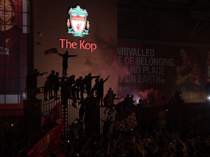 Liverpool fans celebrate winning the Premier League title