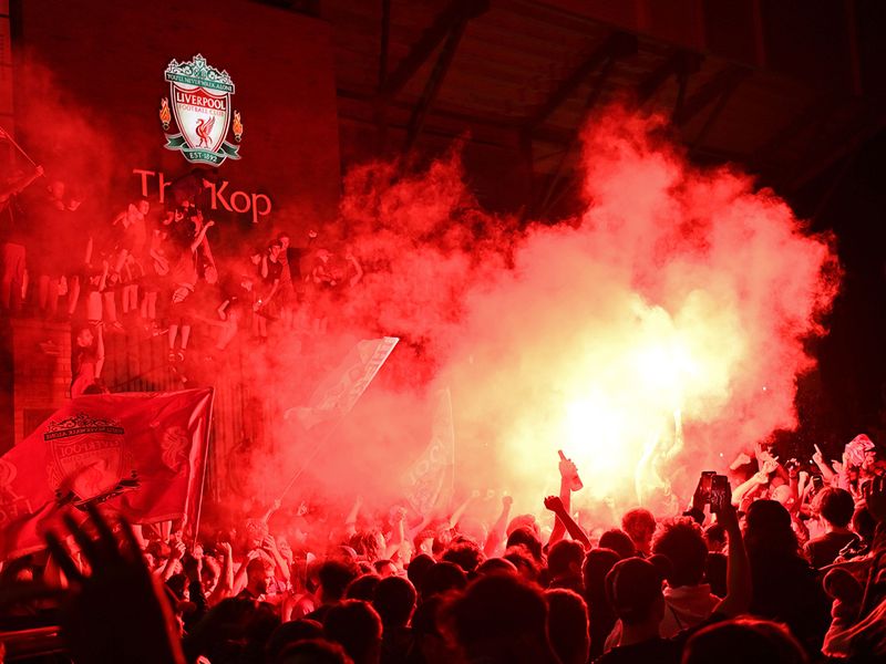 Liverpool fans celebrate winning the Premier League title