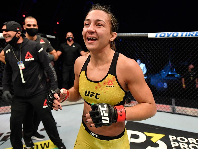 Amanda Ribas of Brazil celebrates after her victory over Paige VanZant in their flyweight fight during the UFC 251 event at Flash Forum on UFC Fight Island on July 12, 2020 on Yas Island, Abu Dhabi,