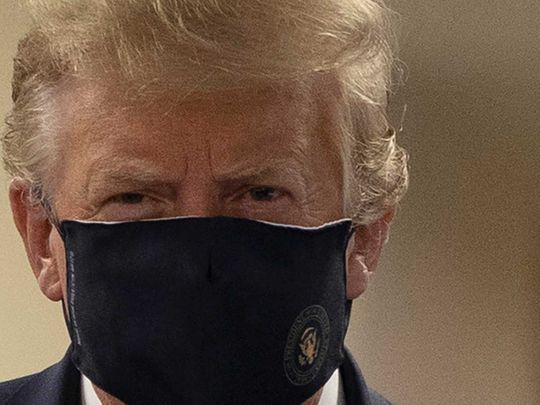 Trump wears a mask