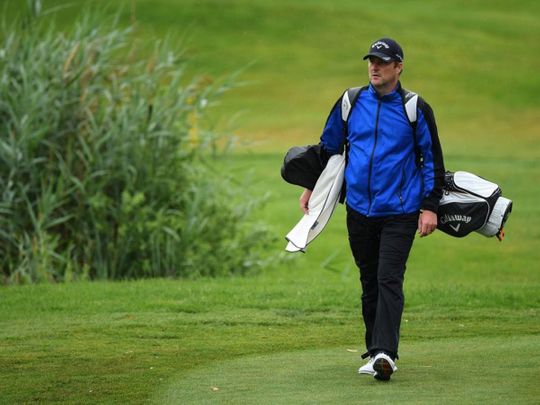 Marc Warren had to carry his own bag on the way to winning the Austrian Open