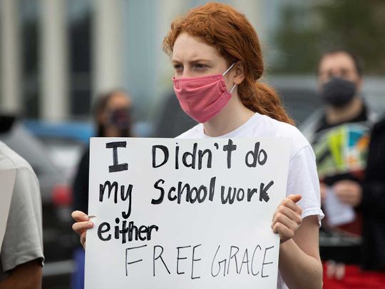 Student protest Michigan Grace schoolwork