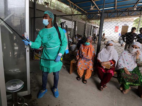 Worker disinfectant karachi Pakistan