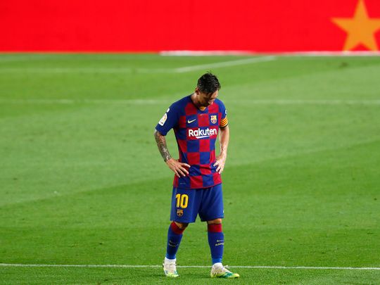 Barcelona's Lionel Messi dejected as walks after the end of the loss to Osasuna