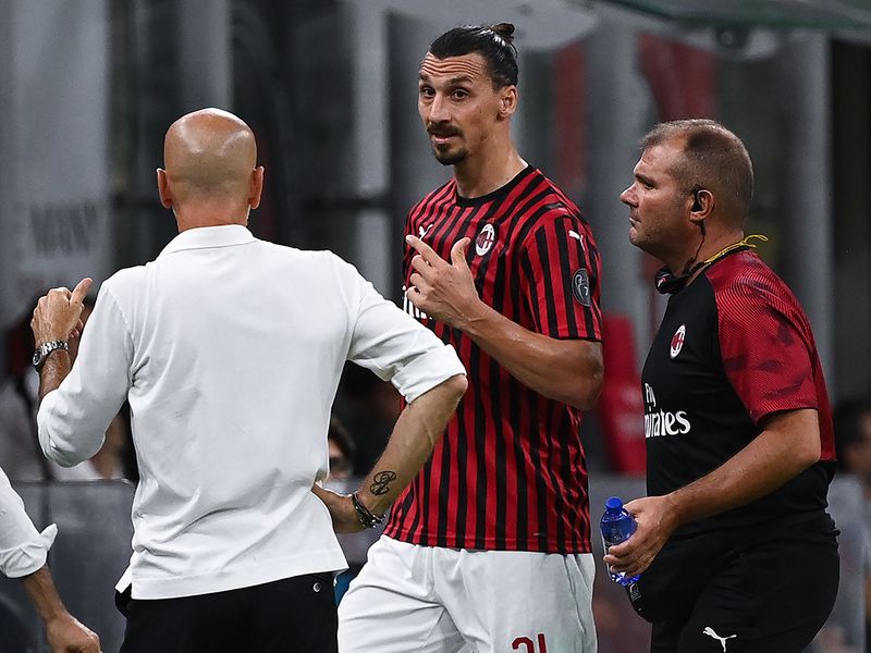 AC Milan’s Zlatan Ibrahimovic argues with coach Stefano Pioli after his substitution