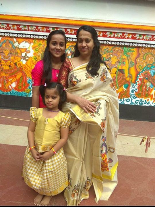 Vidhya with her daughters Shradha and Varadha.