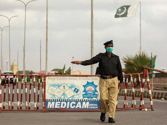 Pakistan eid risk Clifton beach coronavirus policeman