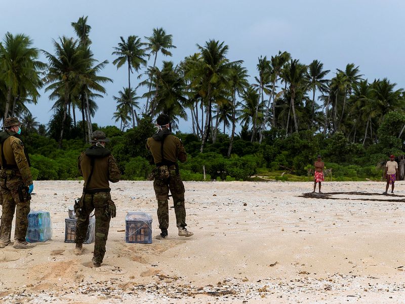 3 men rescued from Pacific island after writing SOS in sand