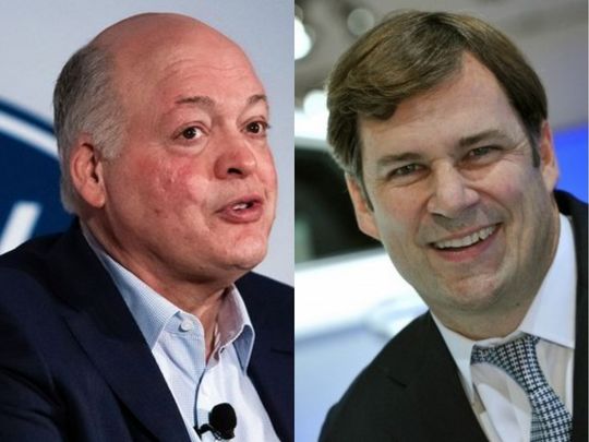 Ford CEO Jim Hackett (left) will retire Oct. 1, after a three-year stint. He will be succeeded by James D. Farley Jr., named chief operating officer in February.