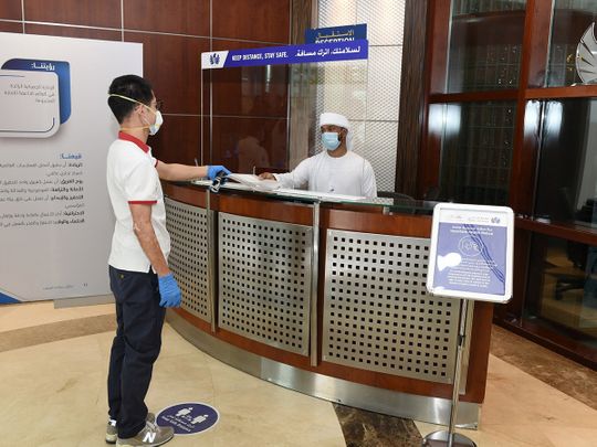 Stock Dubai customs staff at work