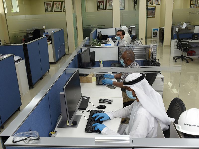 Stock Dubai customs staff at work