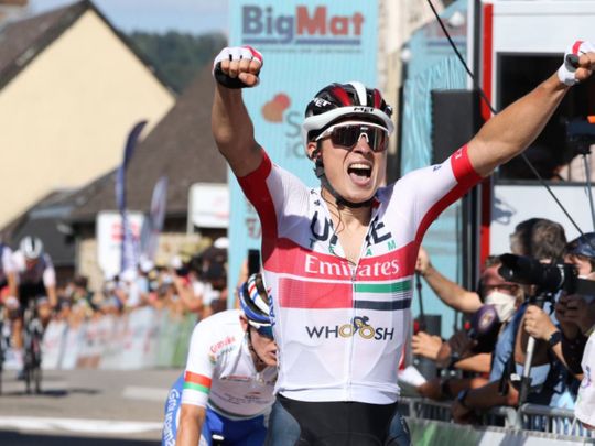 UAE Team Emirates' Jasper Philipsen celebrates the Stage 3 win on the Tour Du Limosin