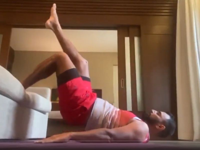 Kings XI Punjab's Mohammed Shami improvises with his hotel room furniture