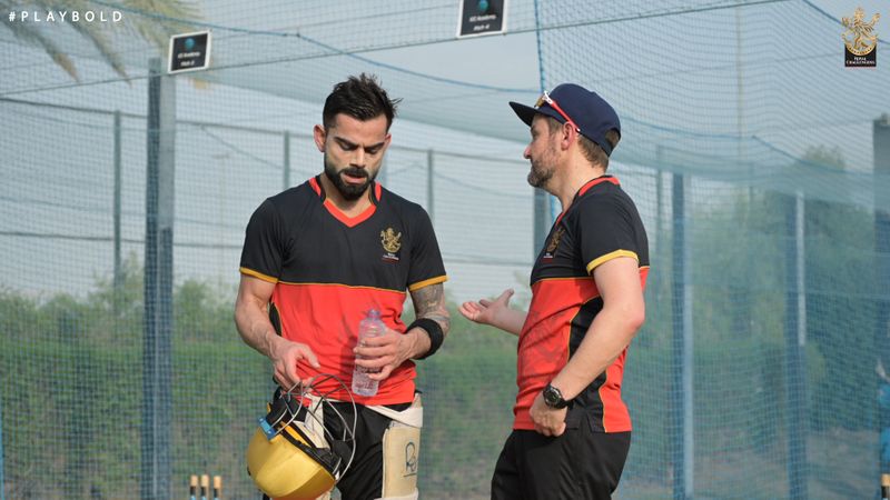 Kohli takes a breather during training in Dubai.