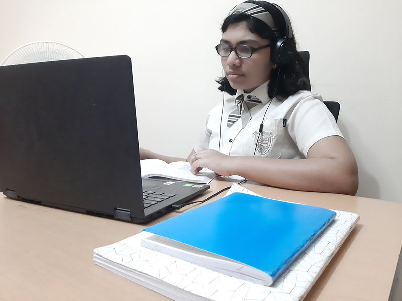 Diya D of grade 9, Our Own English high school, Sharjah attending the e-Learning class on the first day after summer break. Private schools in Sharjah will adopt distance learning for the first two weeks. 