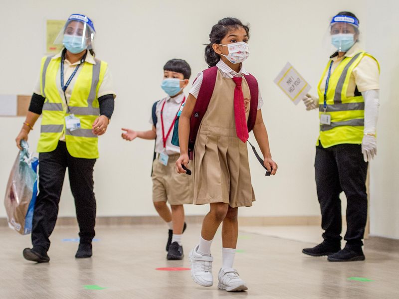 Kids arrive at the Gems New Millennium School Al Khail, Dubai. 