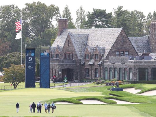 Golfers practise ahead of the 120th US Open at Winged Foot Golf Club in Mamaroneck, New York