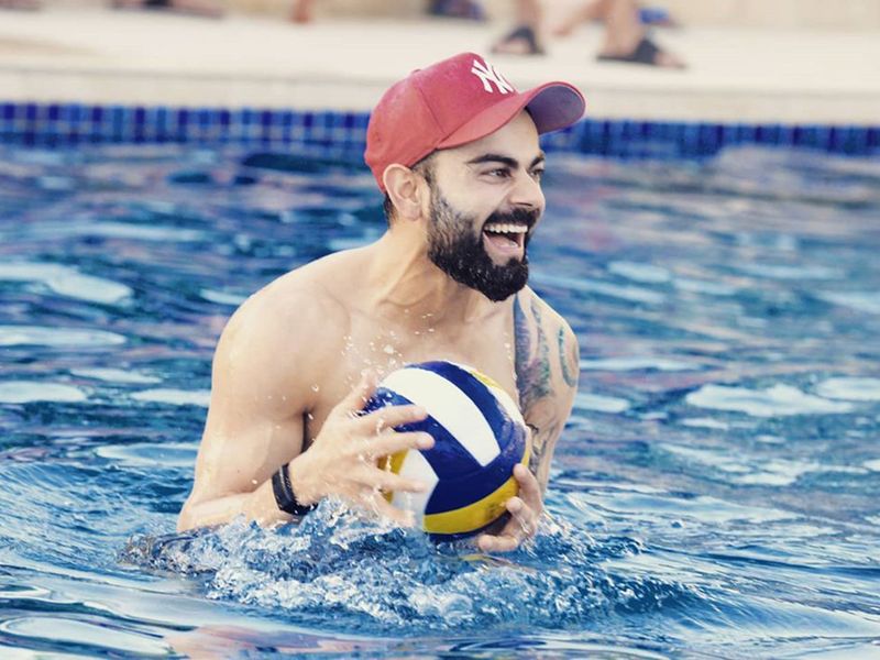 Royal Challengers Bangalore's Virat Kohli relaxes in the pool