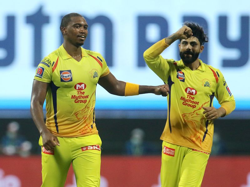 Lungisani Ngidi (left) and Ravindra Jadeja of Chennai Super Kings celebrate the wicket of James Pattinson of Mumbai Indians. 