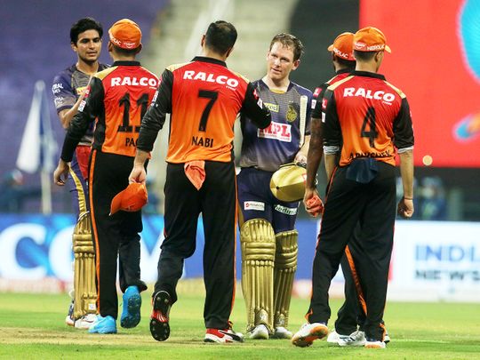 Players of Kolkata Knight Riders and Sunrisers Hyderabad greet each other 