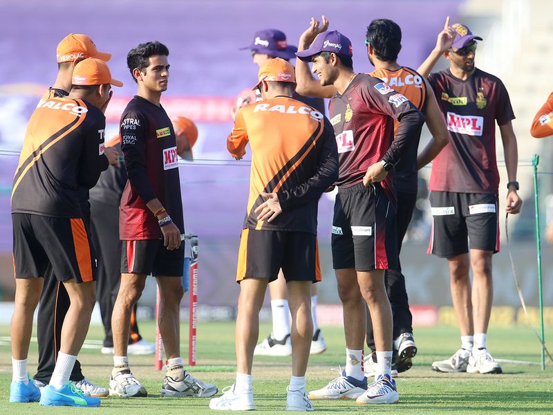 Sunrisers Hyderabad and Kolkata Knight Riders players in the ground before the start of the match at the Sheikh Zayed Stadium, Abu Dhabi. 